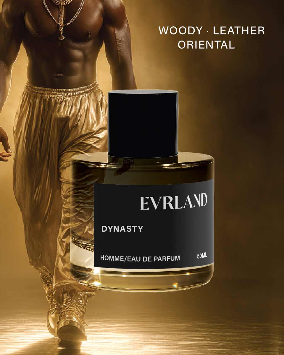 Perfume bottle labeled 'Evrland Dynasty' with a person in gold attire in the background.