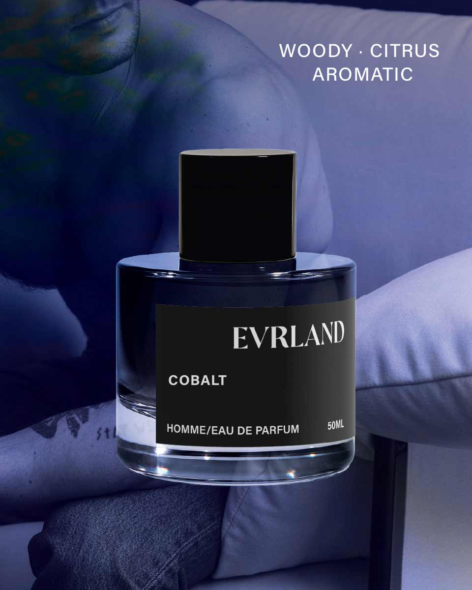 Everland Cobalt perfume bottle with a person sitting in the background