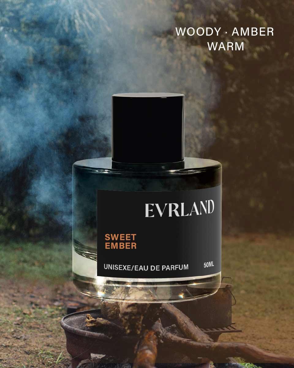 Evrland Sweet Ember perfume bottle with a smokey background