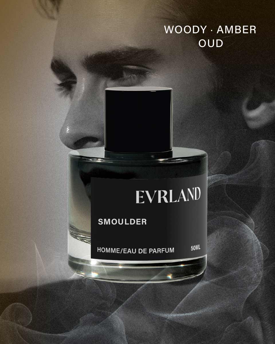 Perfume bottle labeled 'Everland Smoulder' with a person in the background